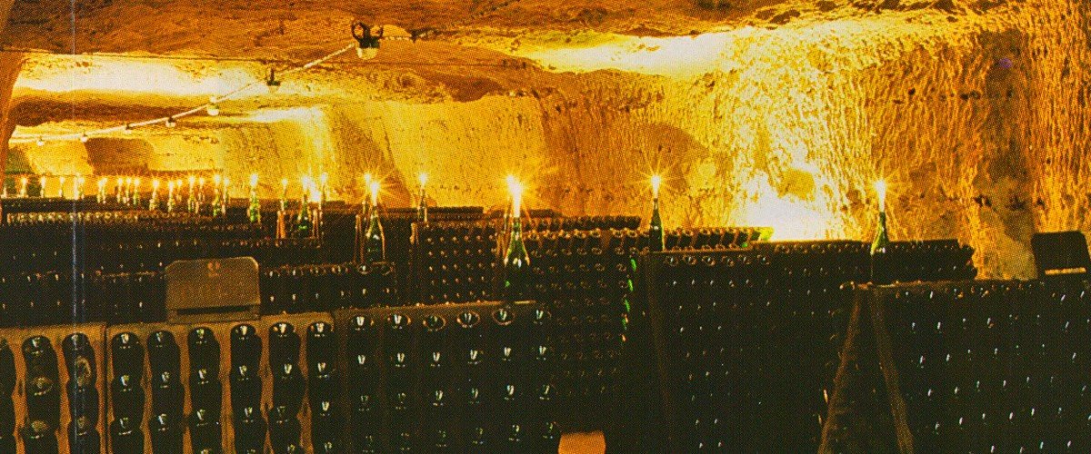 Wine bottles in the cave at Ladoucette